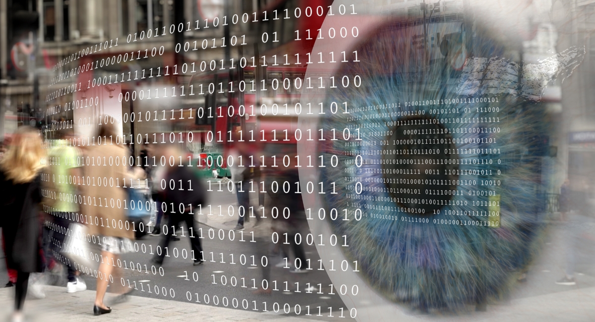 People walking under visible surveillance showing social tension